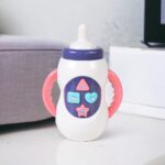 Бебешка играчка "Музикално шише мляко"